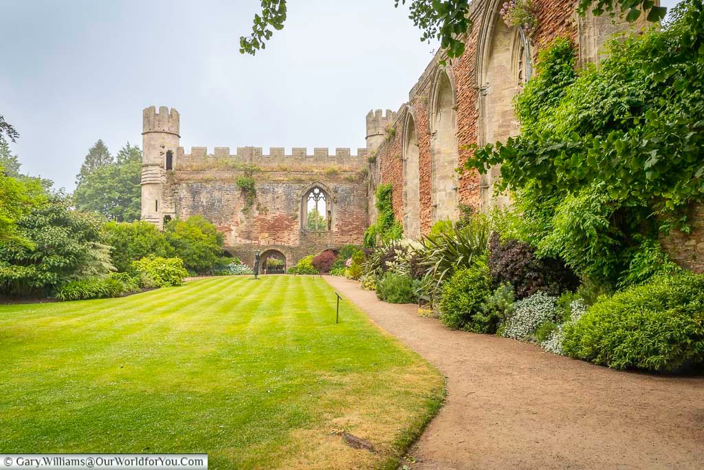 The stone walls and towers are that all that remain of the great hall of the archbishop’s palace in wells, somerset