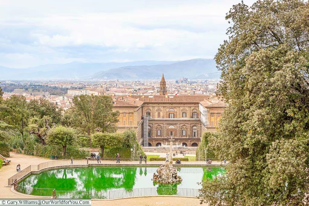 The view of the neptune fountain and pond in the boboli gardens in florence, italy