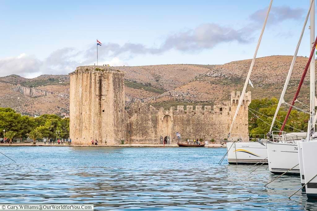 The historic kamerlengo tower on the water's edge in old trogir, croatia