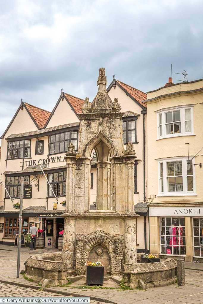 The iconic stone fountain in wells market place, somerset