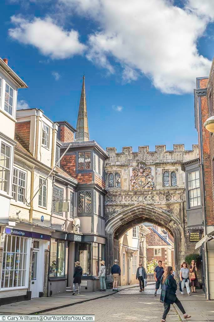 The medieval stone high street gate leading to choristers square in salisbury, wiltshire