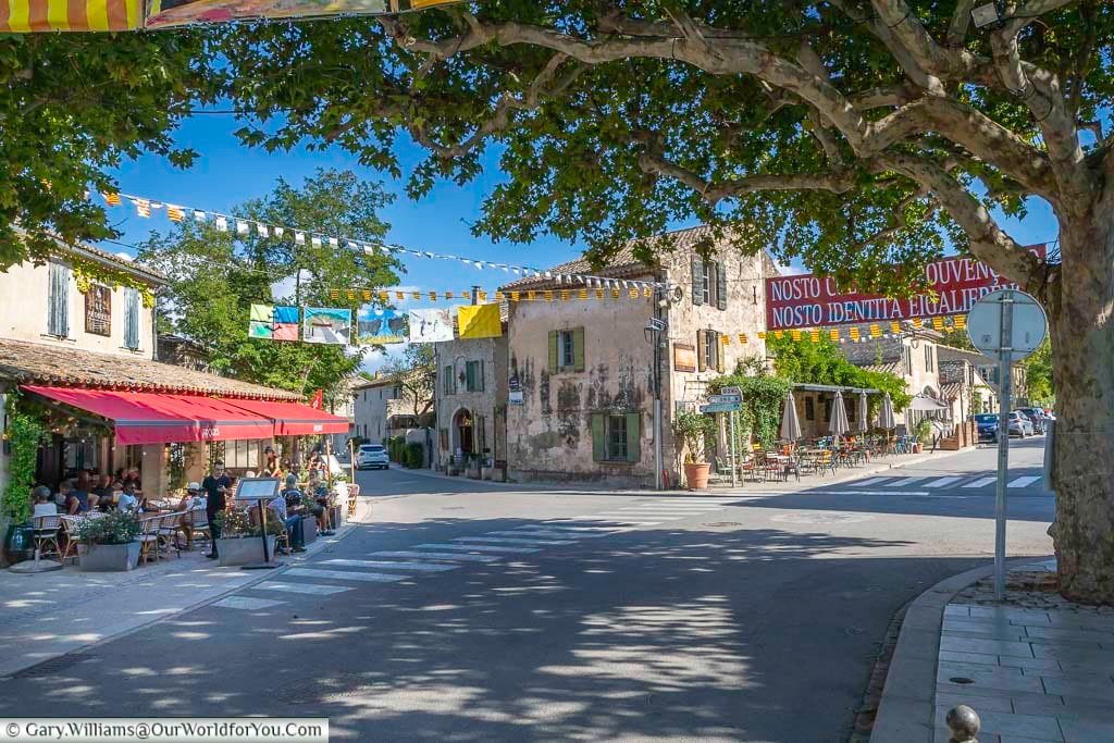 Restaurants around a junction in the provence town of the eygalières in southern france