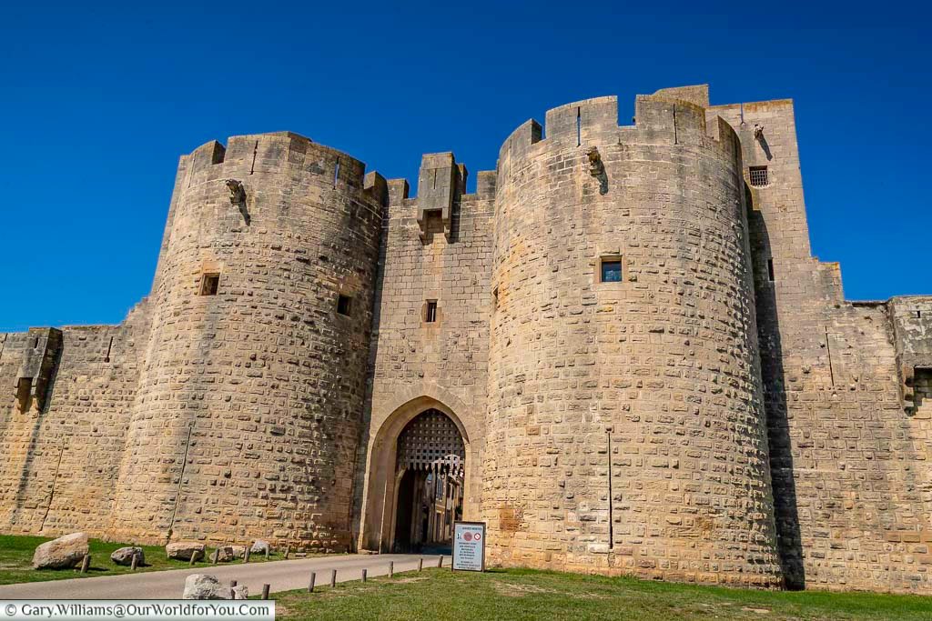 The giant stone porte de la reine, or queen's gate, one entrance to the medieval walled city of aigues-mortes