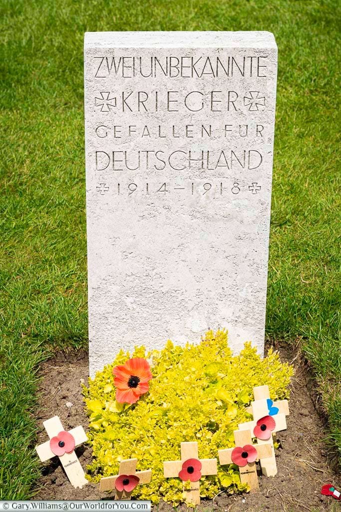 A headstone to two unknown german soldiers at the tyne cot commonwealth war graves cemetery near passchendaele in belgium