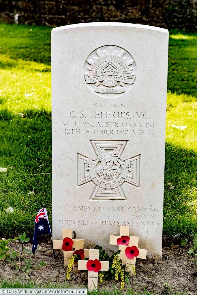 The headstone to Captain Clarence Smith Jeffries - VC, at the tyne cot commonwealth war graves cemetery near passchendaele in belgium