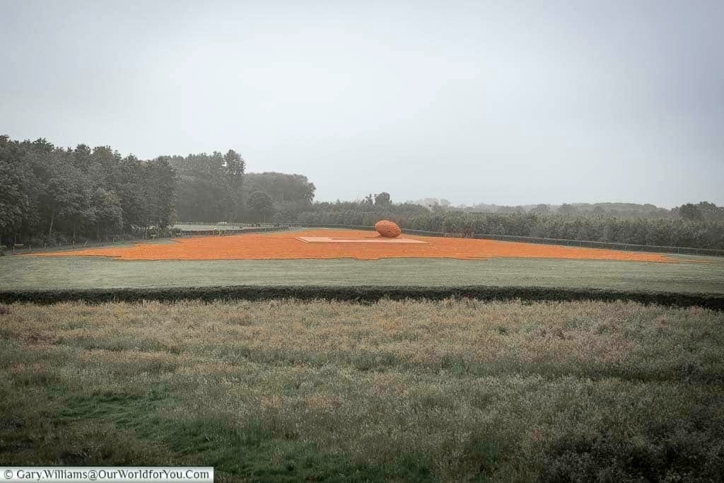 The view from the elevated viewpoint to the thousands of the miniature clay soldiers spilling out of a giant egg at the coming world remember me exhibition in belgium