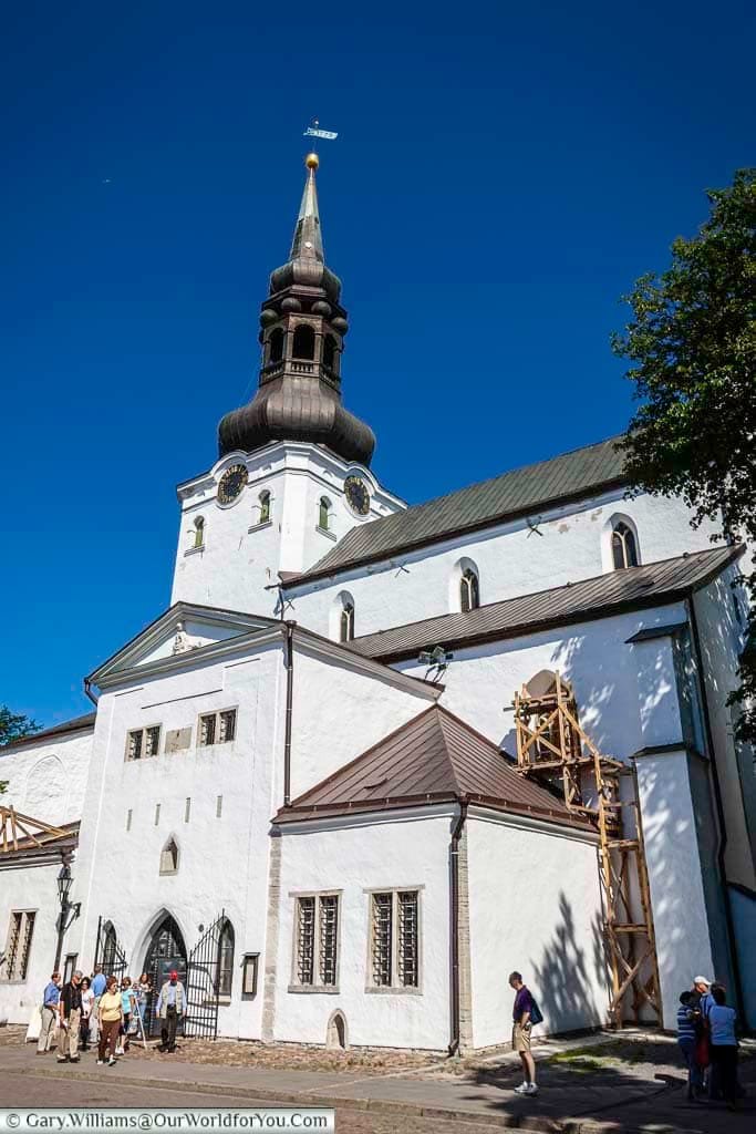 The beautifully white saint mary’s cathedral in tallinn with its darkened bronze spire