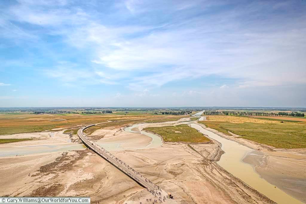 The view of the causeway, and the sandy shores, from the top of Mont-Saint-Michel