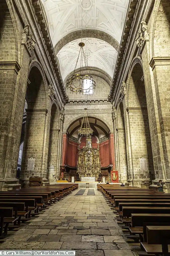 The look along the nave of valladolid cathedral in the castile and león region of spain