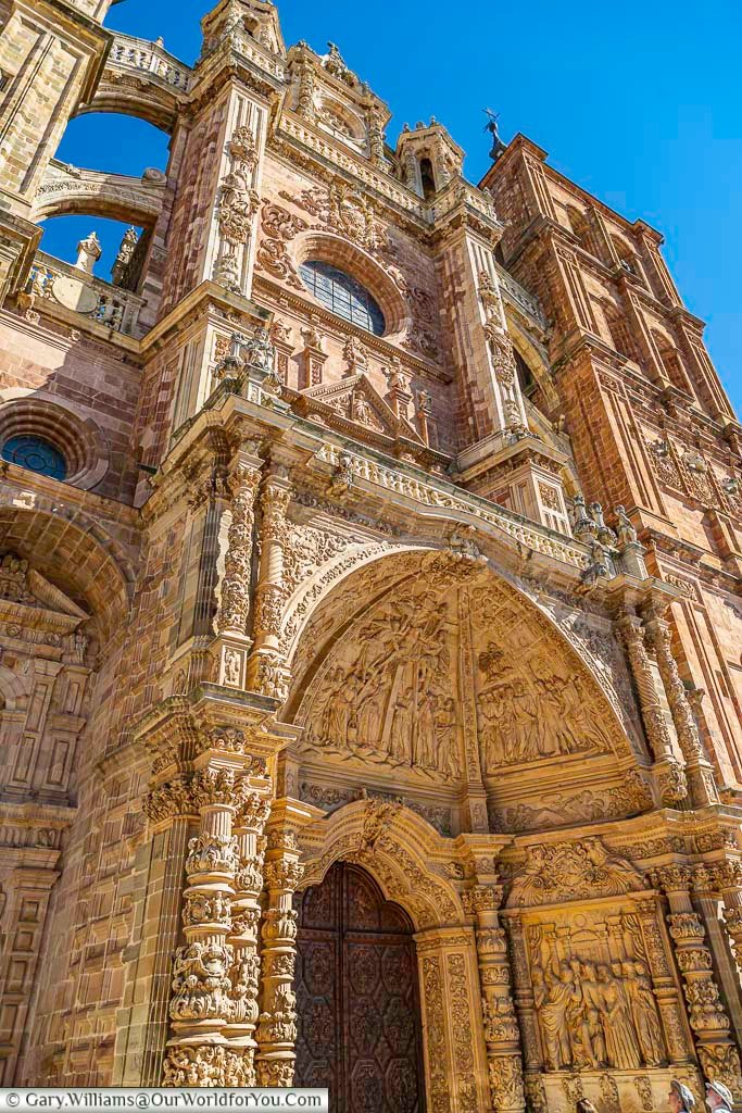The ornately carved stone entrance to astorga catherdral in northern spain