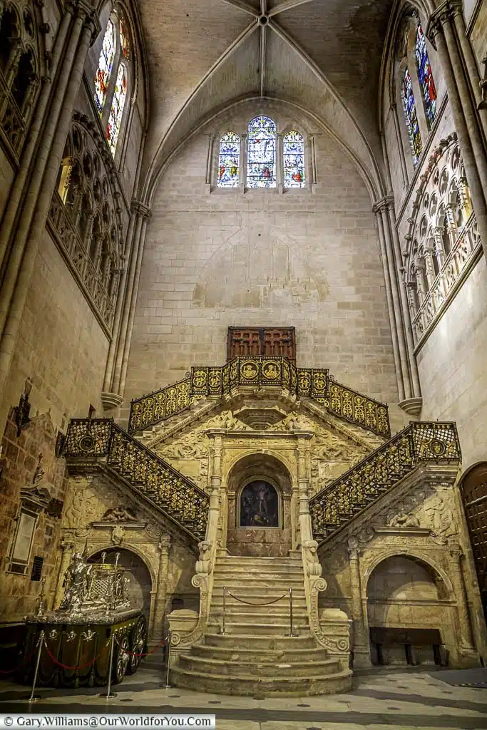 The ornate golden staircase inside burgos cathedral in northern spain