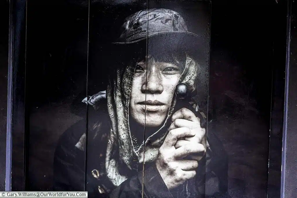 A picture of an oriental pilgrim captured as street art in burgos, northern spain
