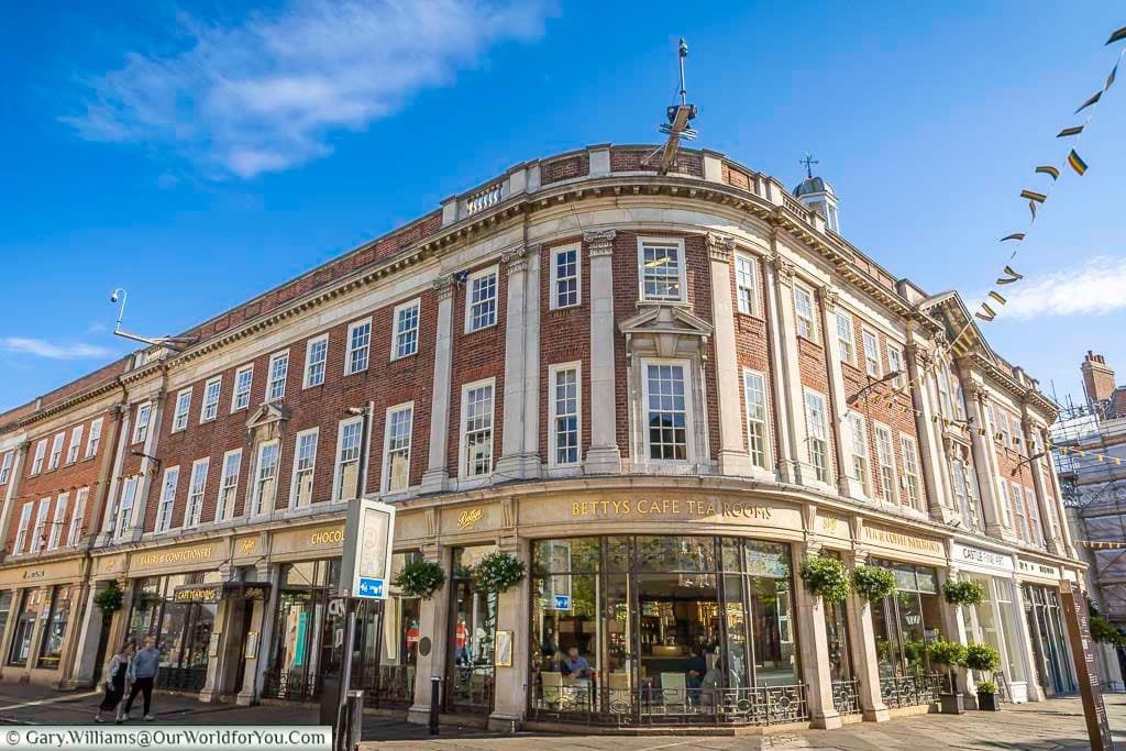 A view of the famous Betty’s Café Tea Rooms in York, housed in an elegant Georgian building on St Helen’s Square. This iconic tearoom is a must-visit York attraction, known for afternoon tea and historic charm.