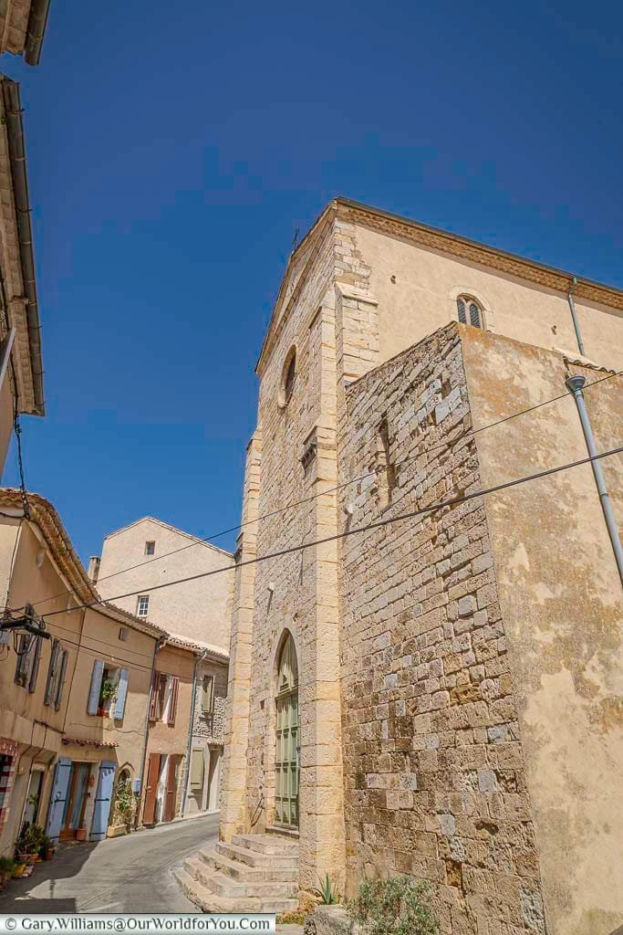 The Église Saint-Blaise de Valensole rises majestically above the narrow village streets, showcasing its centuries-old stone façade and Romanesque architecture. This historic Provençal church is a must-see landmark for visitors exploring the cultural heart of southern France.