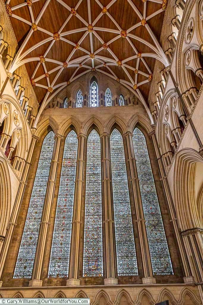 The Five Sisters Window at York Minster, an impressive set of tall stained-glass lancets. This remarkable medieval masterpiece is a highlight for visitors exploring the historic cathedral.