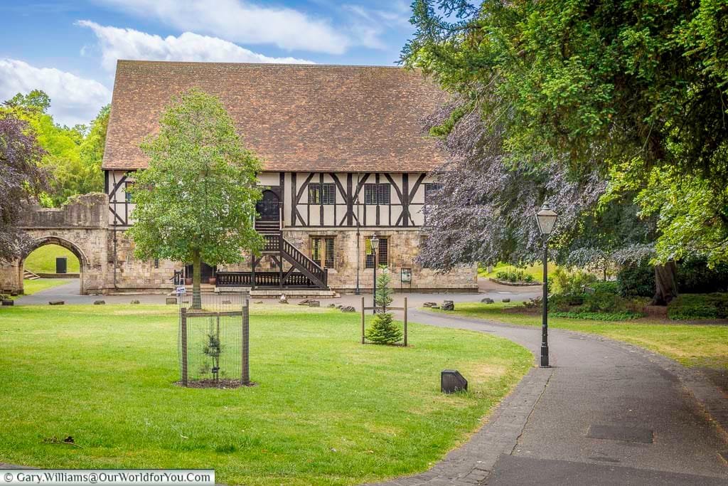 The Hospitium in York’s Museum Gardens is a stunning medieval timber-framed building set among peaceful green lawns and trees. This historic landmark offers a glimpse into York’s rich monastic past.
