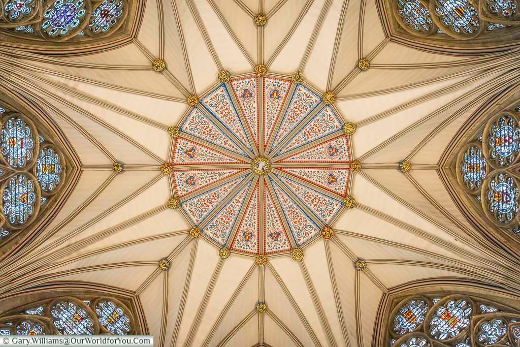 The ornate roof of the Chapter House in York Minster with colorful painted decoration and intricate design. This stunning feature showcases the artistry and craftsmanship of medieval York.