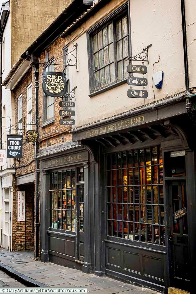 The Shop That Must Not Be Named in York is a Harry Potter-themed store on the famous Shambles. Its quirky design and magical atmosphere make it a popular attraction for fans and tourists alike.