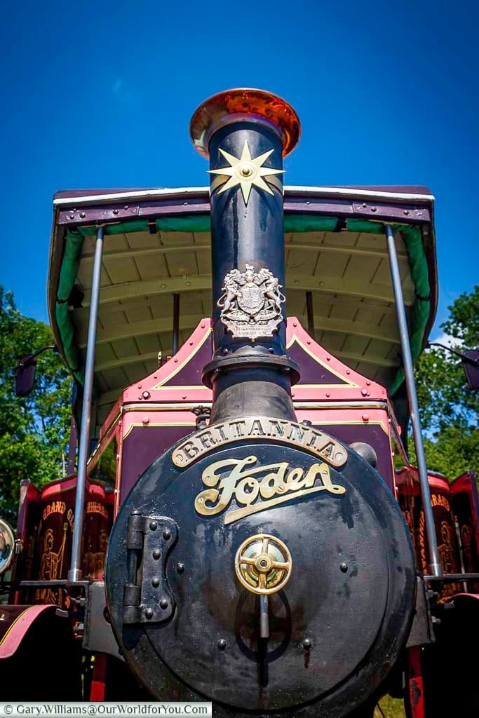 Close-up of the vintage “Britannia” Foden traction engine on display at the Kent County Show, celebrating British engineering heritage. This beautifully preserved steam-powered engine draws crowds at rural events and country fairs across the UK.