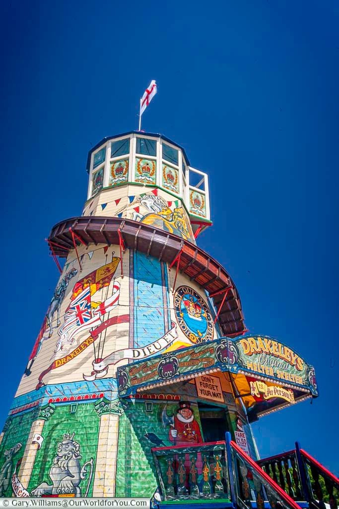 Drakely’s Original Helter Skelter dazzles visitors with its colourful fairground artwork under a perfect blue sky. This iconic ride brings nostalgic charm to the traditional Kent County Show experience.