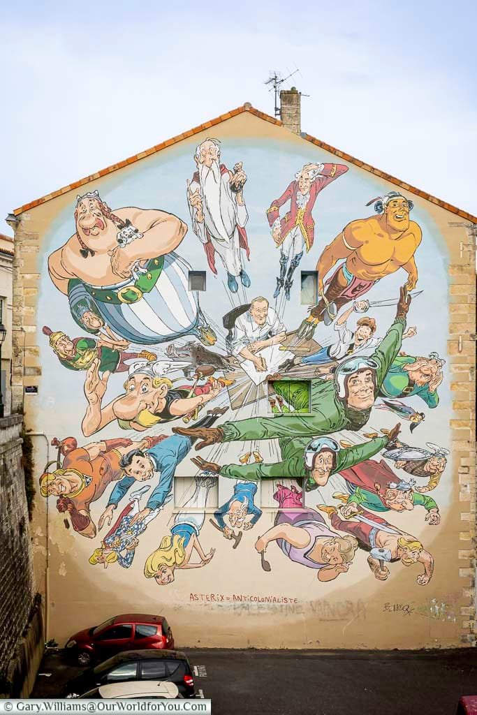 Lively wall mural featuring characters by Albert Uderzo, including Asterix and Obelix, in France’s comic capital, Angoulême. This public artwork celebrates French comic book culture and is a vibrant stop on any artistic road trip through France.