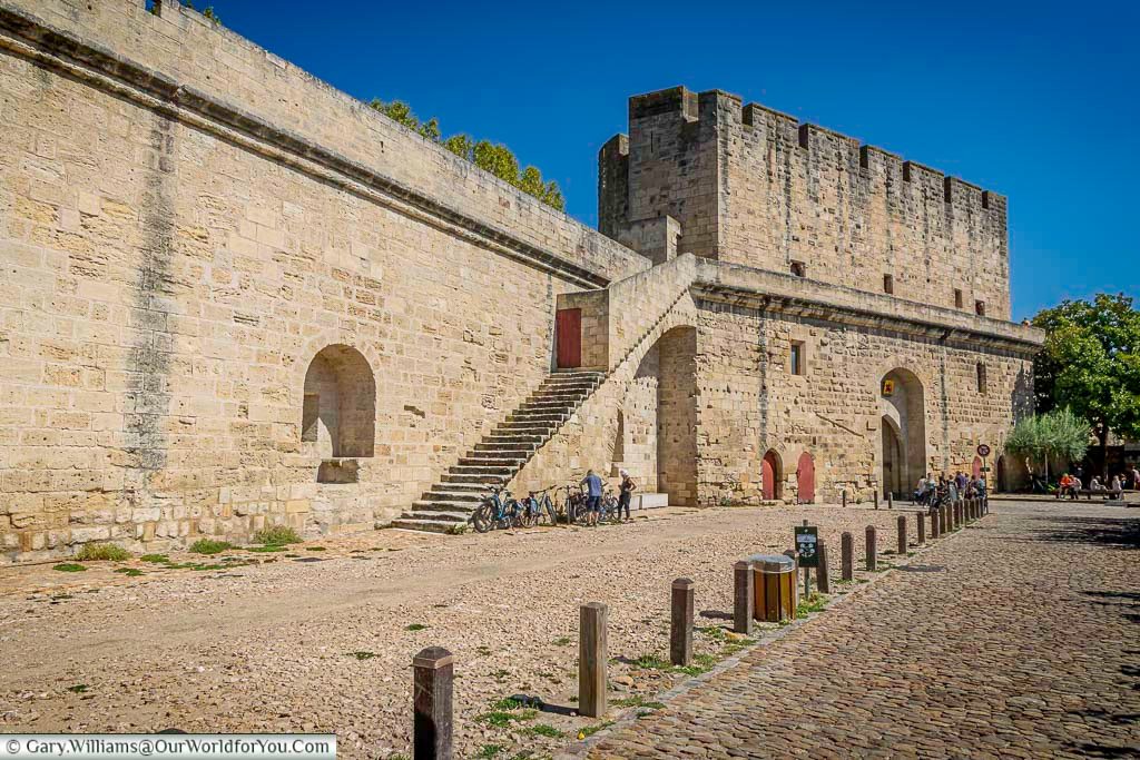 A wide view of the 13th-century ramparts in Aigues-Mortes reveals the scale of this well-preserved medieval fortress. Stroll along the ancient walls for panoramic views and a taste of France’s military past.