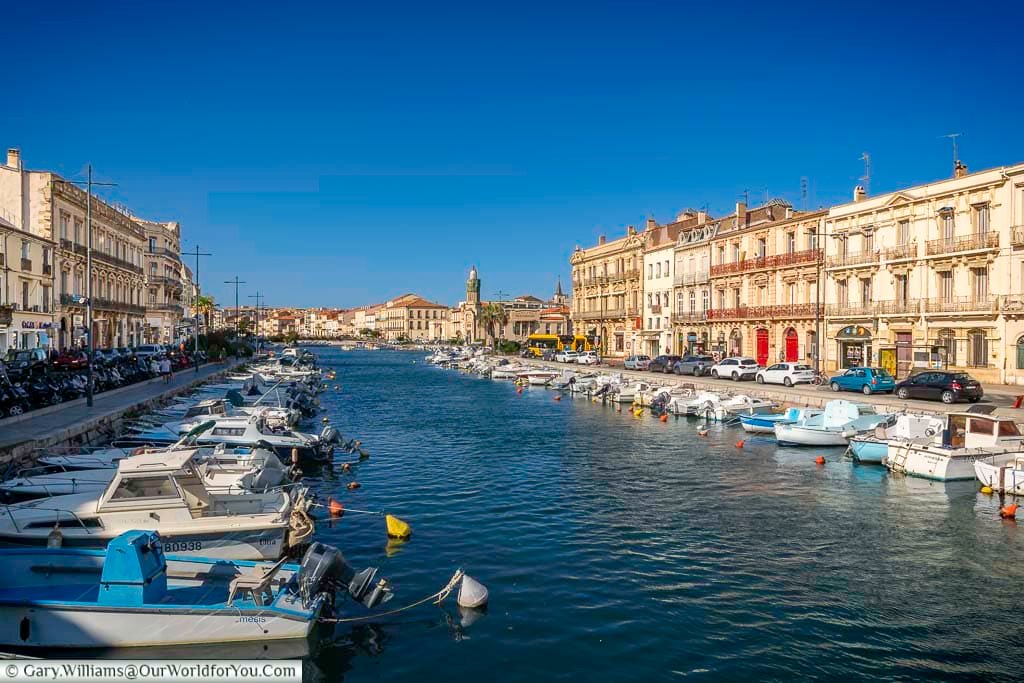 The bustling quays of Sète come alive with moored boats and lively cafés, where locals and visitors soak up the Mediterranean sunshine. Historic buildings and vibrant street life make this waterfront a favourite spot for canal-side strolls.