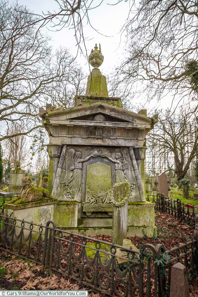 The wrought iron railing around the crypt of Andrew Ducrow, a British Circus performer, in Kensal Green Cemetery