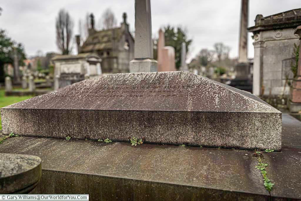A weathered grey granite tomb of Prince Augustus Frederick, Duke of Sussex and son of King George III.