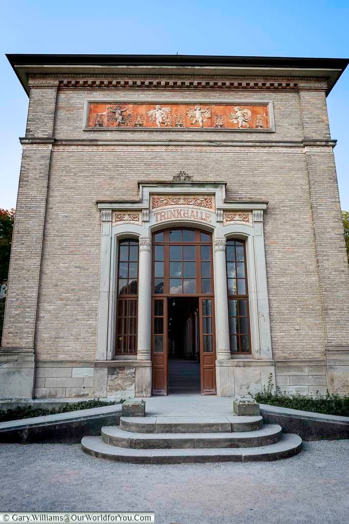 Entrance to the Trinkhalle in Baden-Baden, showcasing classical stonework and ornamental detailing. The building played a central role in the town’s spa culture and remains a key historic attraction.