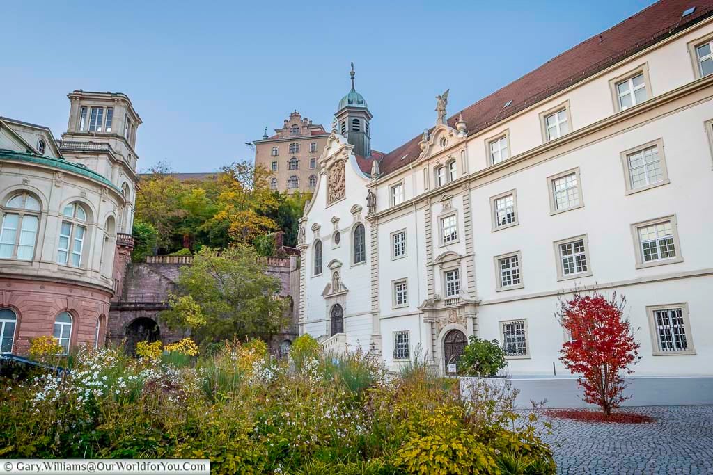 A scenic view up towards Neues Schloss reveals Baden-Baden’s dramatic hillside setting above the town. The historic castle overlooks the spa district and offers insight into the area’s royal past.