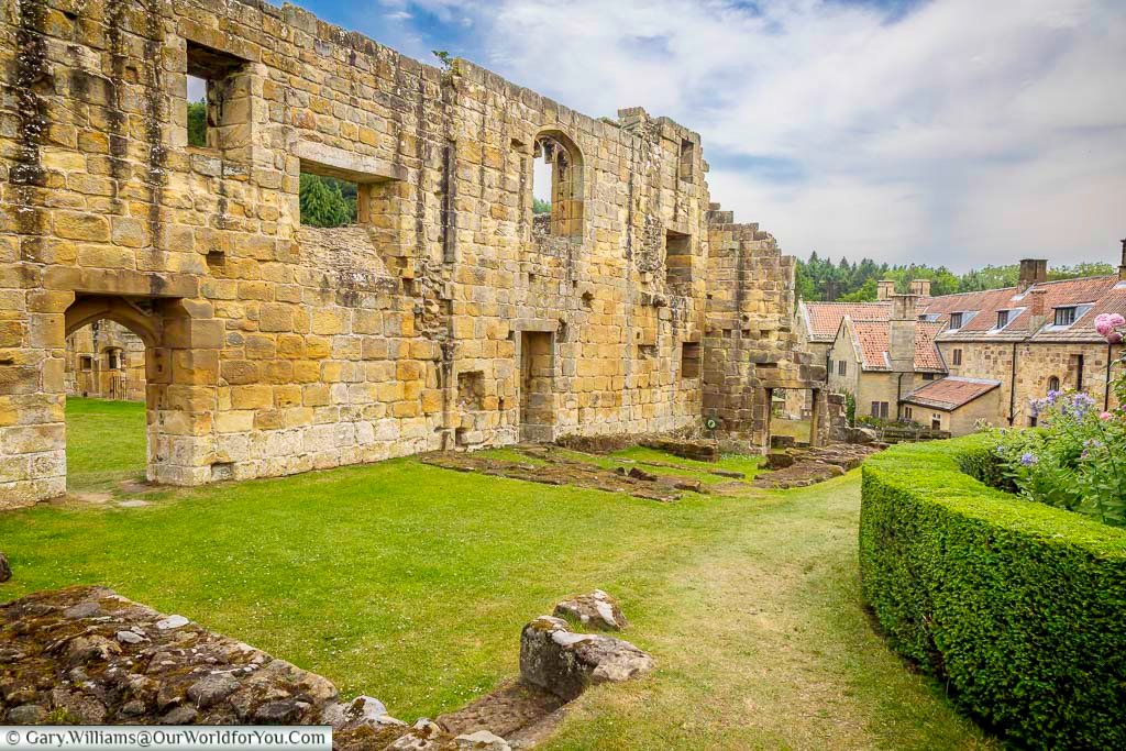 Ancient stone walls and archways reveal the atmospheric ruins of Mount Grace Priory in North Yorkshire. The remains of this medieval Carthusian monastery provide a fascinating insight into monastic life in England.