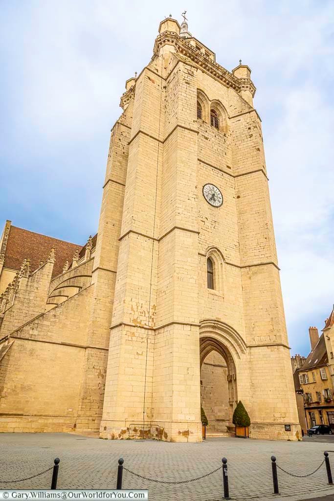 The imposing bell tower of the Collégiale Notre-Dame de Dole dominates the historic centre, showcasing impressive Gothic architecture and centuries of French heritage. This iconic landmark is one of the top attractions in Dole, Jura, and a must-see for visitors exploring eastern France.