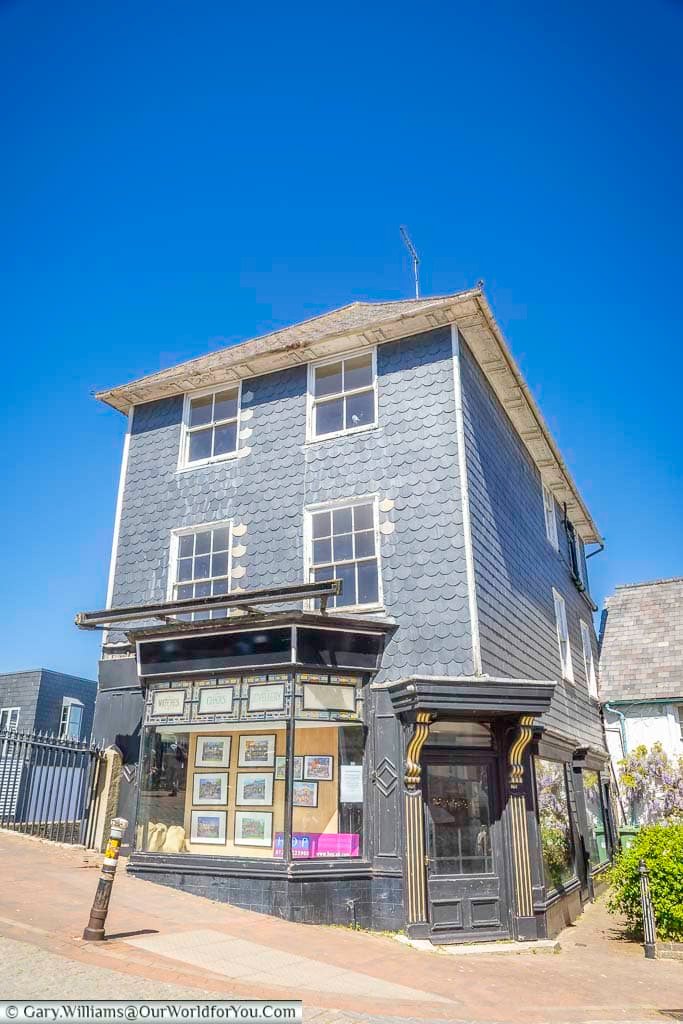 An attractive old corner building and traditional shopfront in central Lewes, another example of the wonderfully varied architecture found around the town.