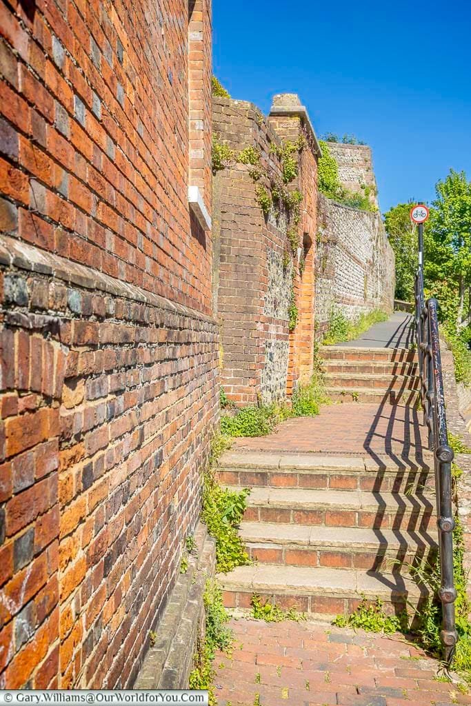 Brick steps and historic flint walls along one of Lewes’s quieter pathways, capturing the layers of architecture found throughout the old town.