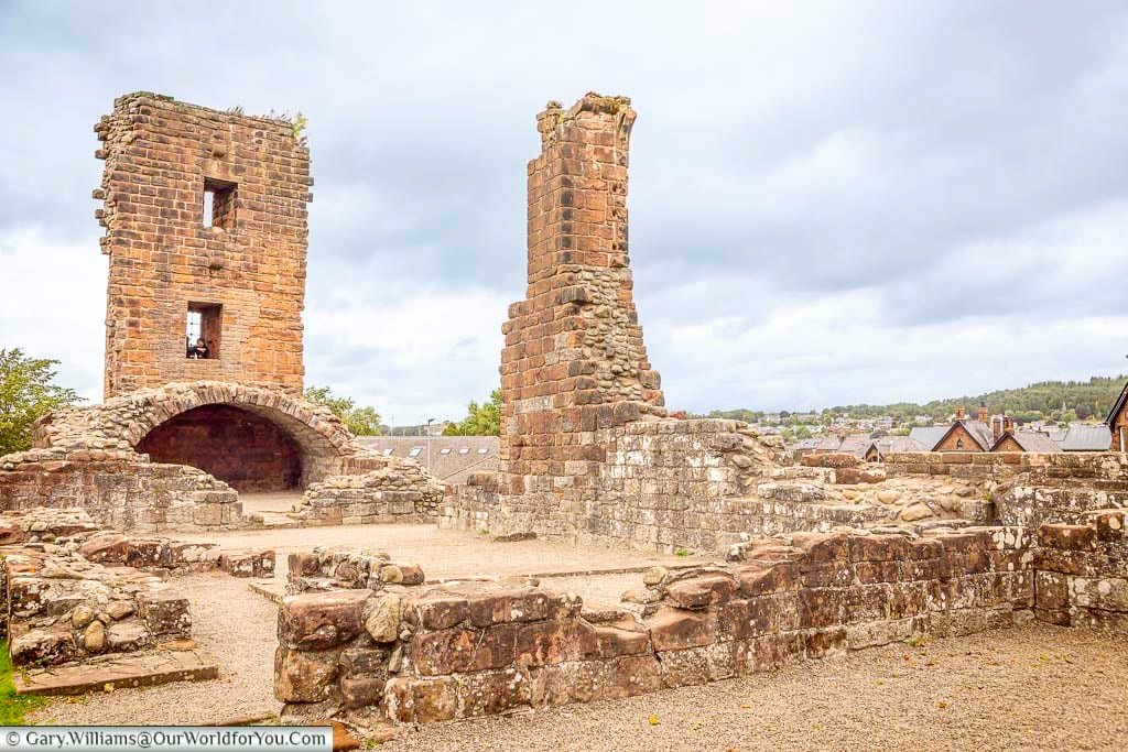 The remains of Penrith Castle reveal ancient sandstone towers, defensive walls and the foundations of this once-impressive medieval fortress. Located in the heart of Penrith, the historic castle is now surrounded by a peaceful public park.